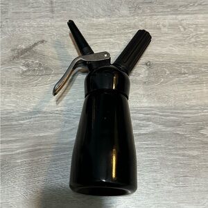 Whipped cream dispenser